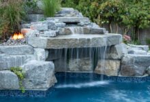 The Role of Water Features in Pool Design: From Fountains to Waterfalls